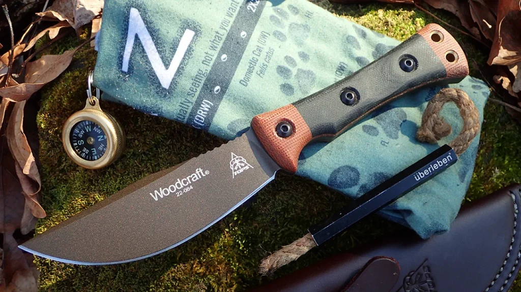 Experience part of bushcraft history with TOPS Knives' take on the Marbles Woodcraft knife.