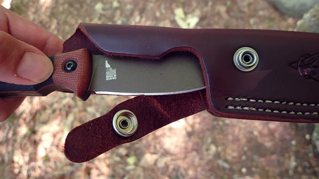 The author observed that the closure strap on the Woodcraft sheath gets slightly cut whenever the knife is taken out unless proper care is taken.