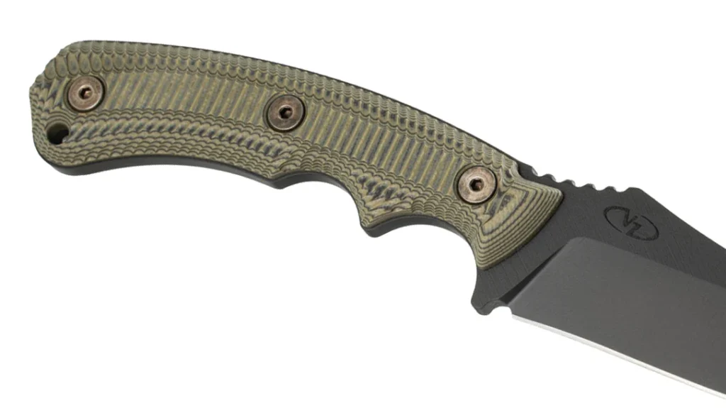 Texture on the G-10 scales is aggressive enough to matter, yet the edges are broken. So, they do not chew your palm.