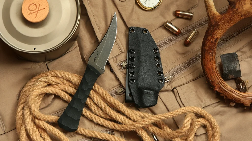 Introducing the Auxiliary Manufacturing Pocket Bowie XL Knife, a modern interpretation of the classic American Bowie knife.