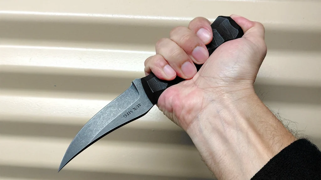 The Ice-Pick Grip, also known as reverse grip edge out (RGEO), is typically the comfiest way to grip a knife thanks to its clever handle design.