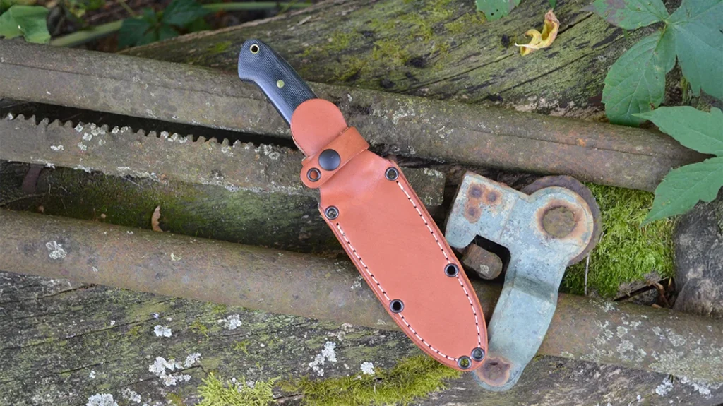 The included leather sheath has a snap closure that keeps the knife secure.