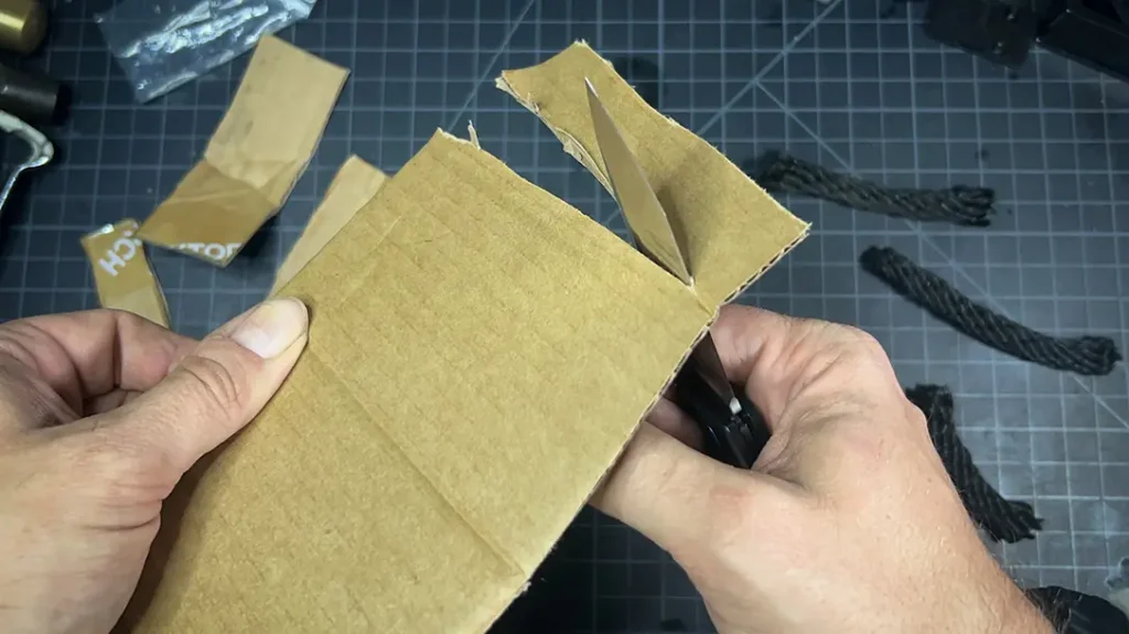 The edge of the Bear OPS Nekama held up well to cardboard.