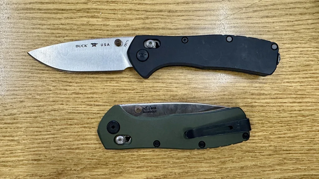 Range Elite Series knives open and closed with black and green handles.