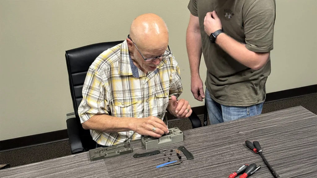 Author assembling a Buck Knives Range Elite series knife.