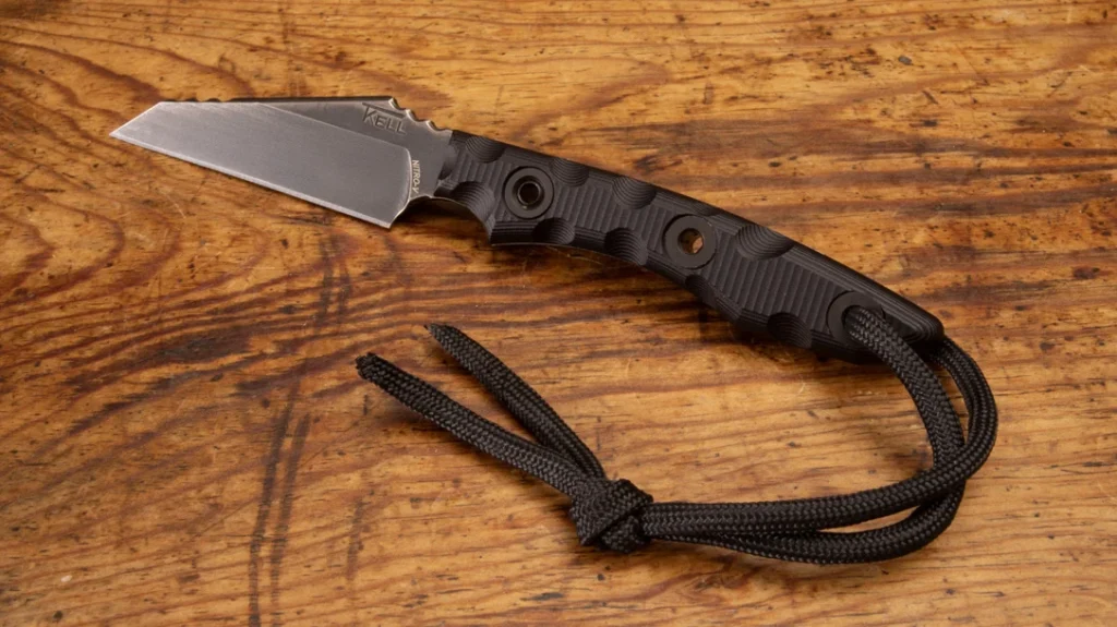 Kell’s “lashing screws” are hollow to do double duty as lanyard holes and lashing points without adding extra holes to the handle.