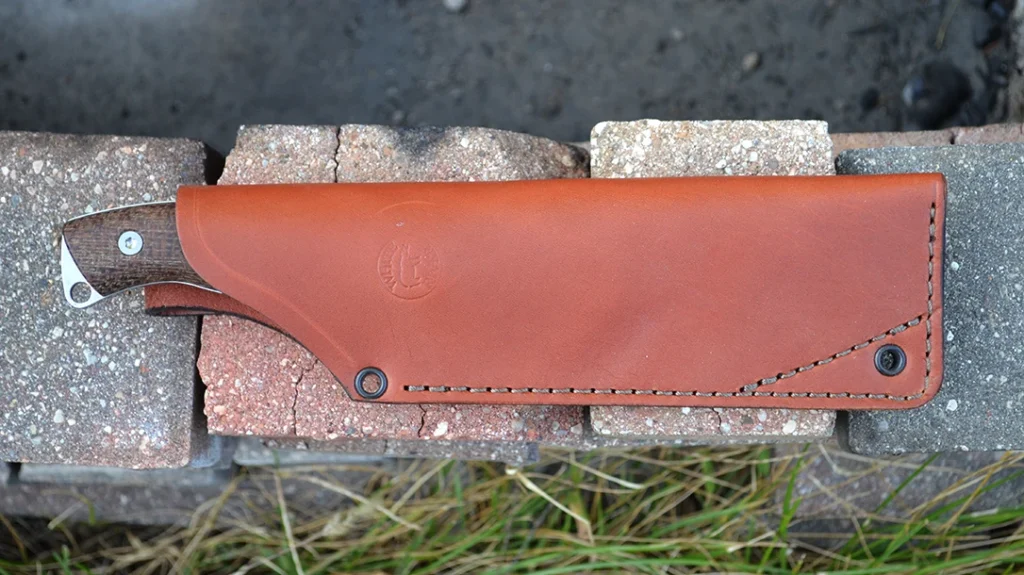 The leather sheath is sturdy and well-made, but you might want to add a lanyard to the knife’s handle.