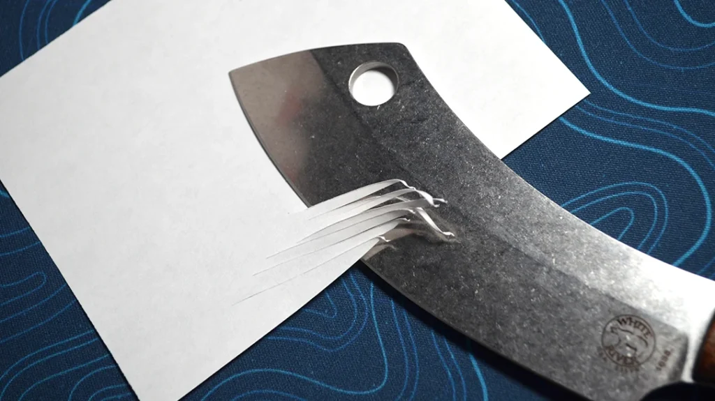 Even after all sorts of use, the White River Camp Cleaver still sliced paper like a dream.
