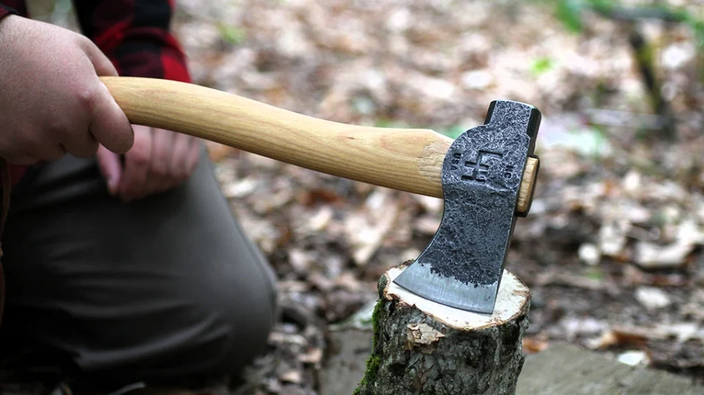 Nessmuk Trio: Nuge splits dead wood about 3-4 inches wide using the Hoffman Trapper's Hatchet. You’d be hard-pressed to find another hatchet of this quality—Nessmuk would be impressed!