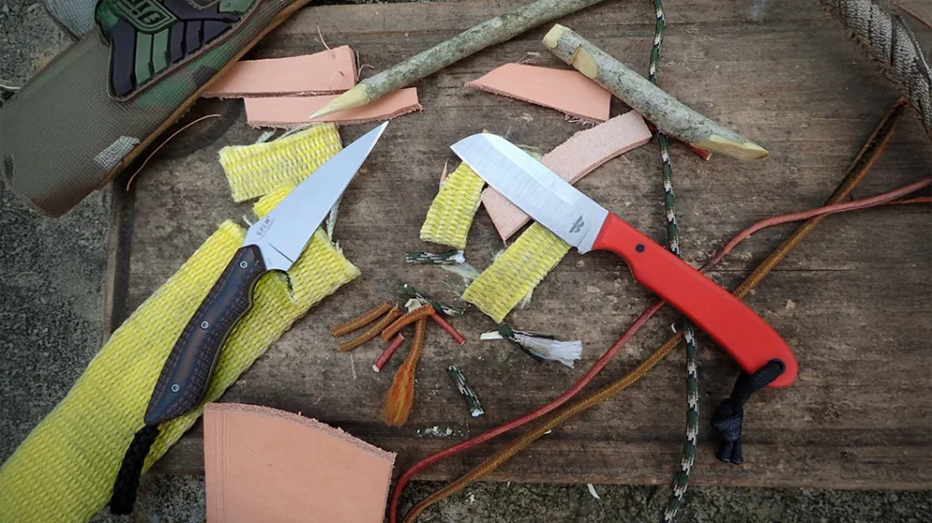 The NBN Sheepsfoot Chickpea and CRKT S.P.E.W. knives each crafted a tent stake and trap parts, demonstrating their suitability for the woods.