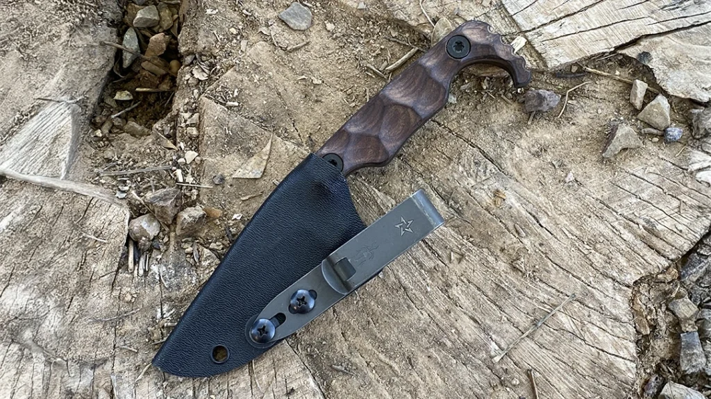 The sheath secures the knife with a rattle-free hold, keeping it locked in place even during vigorous movement or inverted handling.
