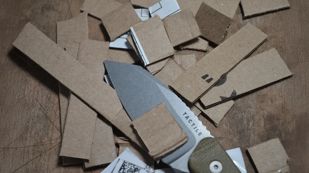 Corrugated cardboard posed no problems at all, whether sliced with or against the grain.