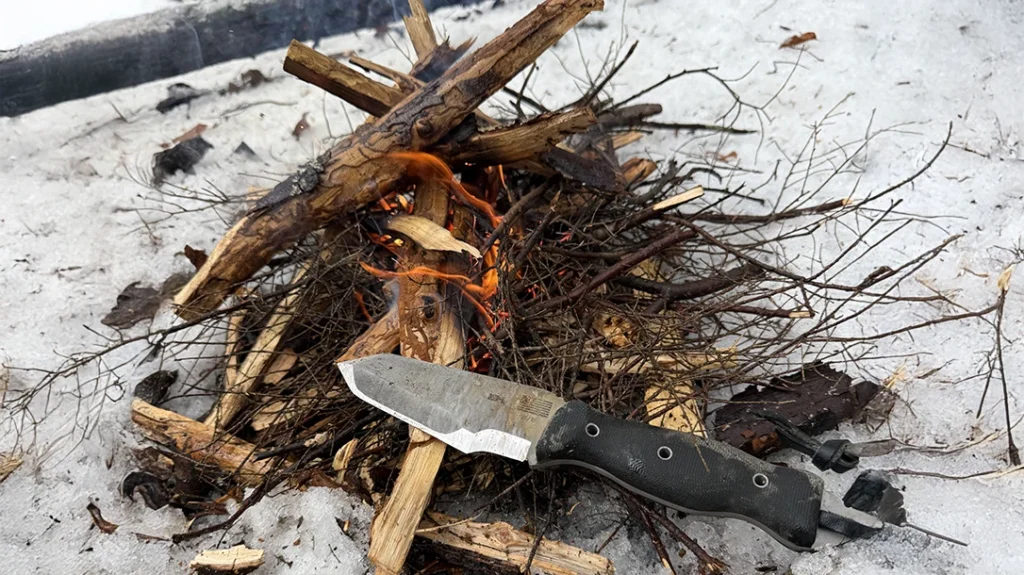 The author used the WC Knives WCFK to pry apart pallets for firewood and to demonstrate fire-starting.