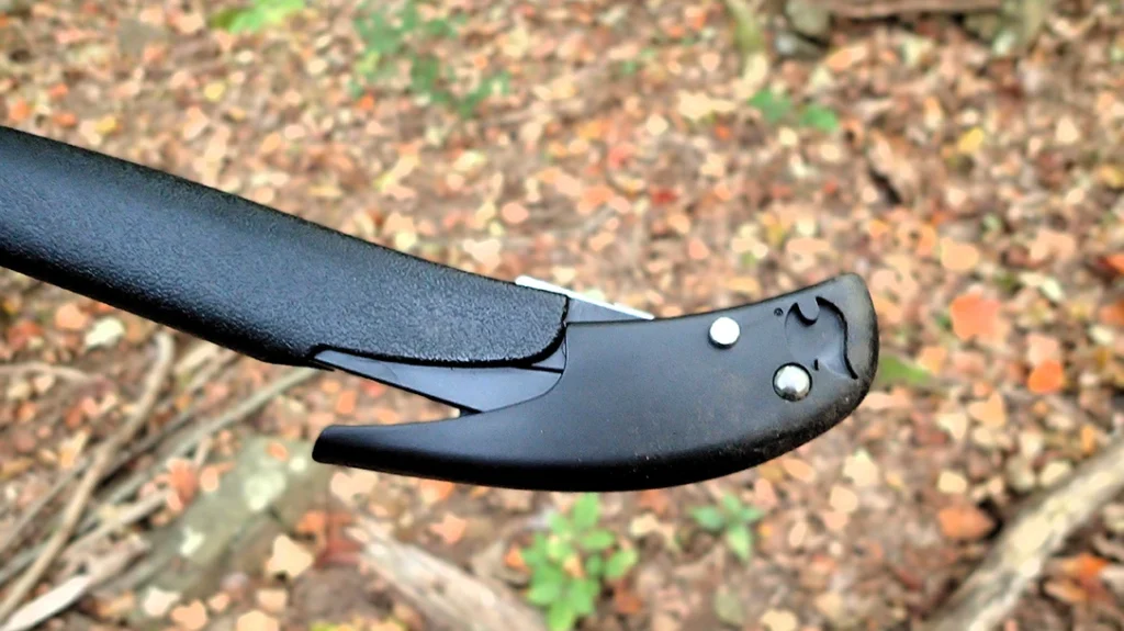 The cam lever on the Zippo AxeSaw came loose a few times while the author was chopping, causing the metal portion to interfere with the grip.