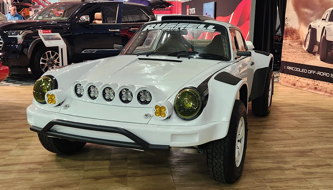 A fully built Porsche rally race car.