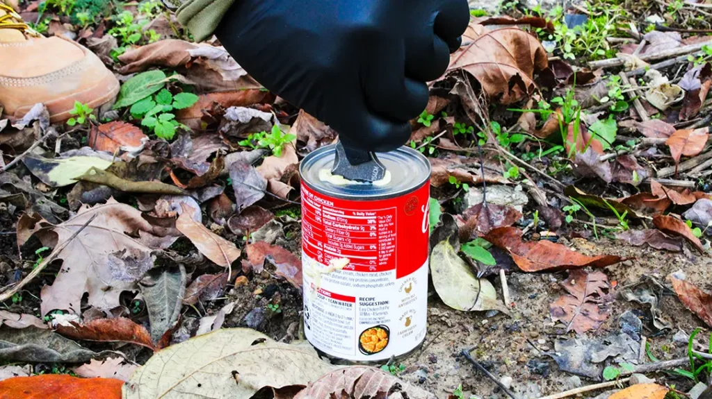 The author easily punched through both the side and top of a can of Cream of Chicken Soup.