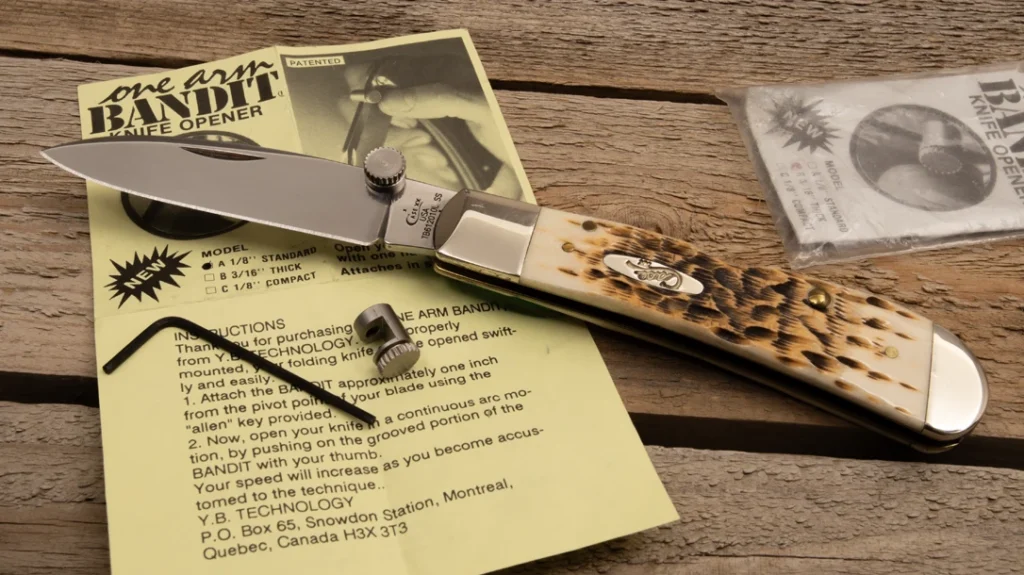 History of Thumb Openers: The One Arm Bandit was another aftermarket accessory that gave standard folders a purchase for one-handed opening.