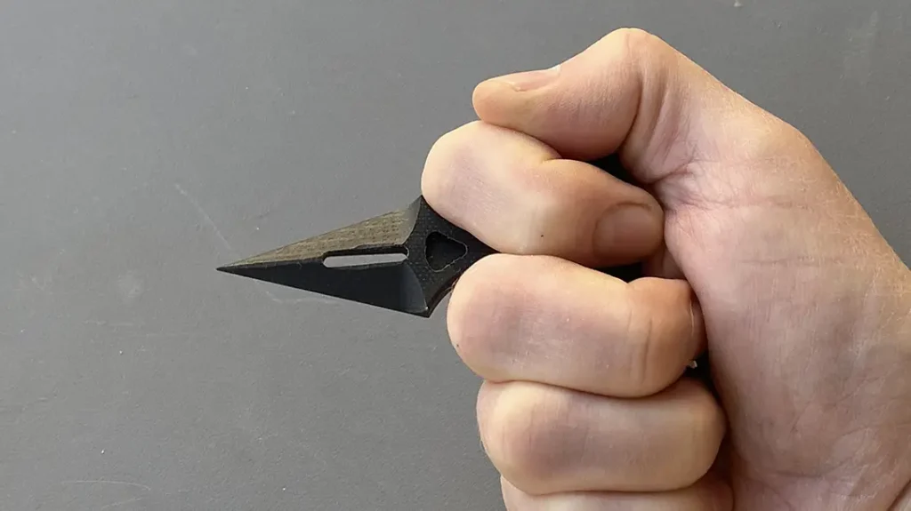 The ambidextrous design and contoured handle provide a secure grip, ensuring ease of use in high-pressure situations.