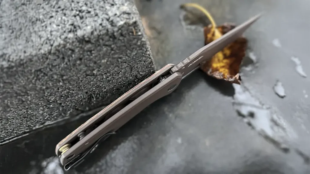 The simple construction of the knife creates a thin, pocketable knife. For those who like to add a lanyard, a large, bronze anodized standoff is included at the rear of the handle.