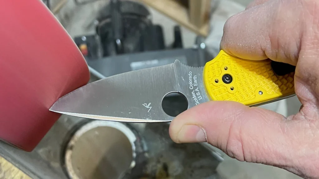 Making a Training Knife: The first step was to grind the edge off the blade, taking it to a blunt flat about as dull as a butter knife.