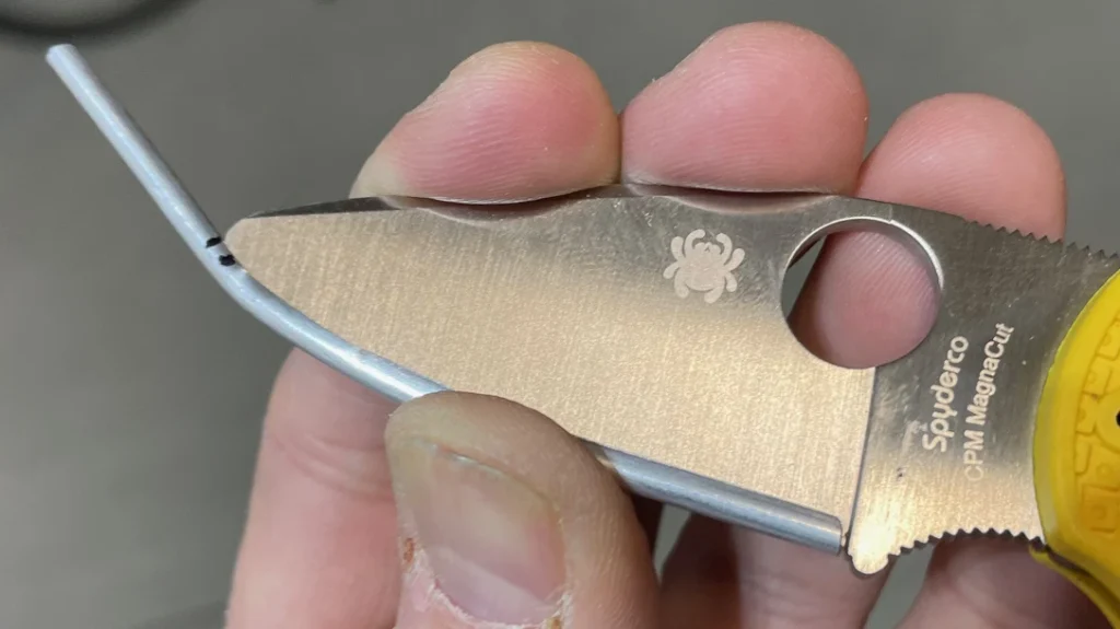 With the tubing slit, the author cut the tubing to length and carefully dry fit it to the curve of the blade’s edge.