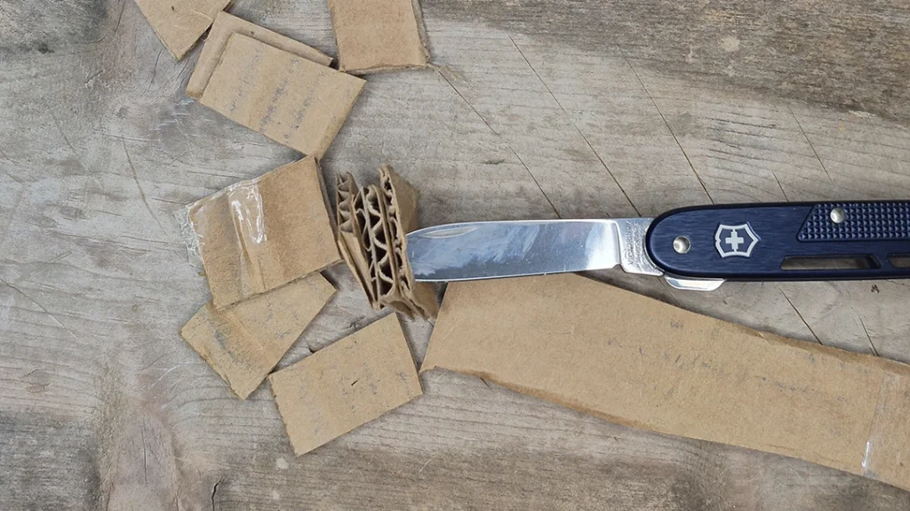 Corrugated cardboard was no trouble at all for the Victorinox Onefold Alox.