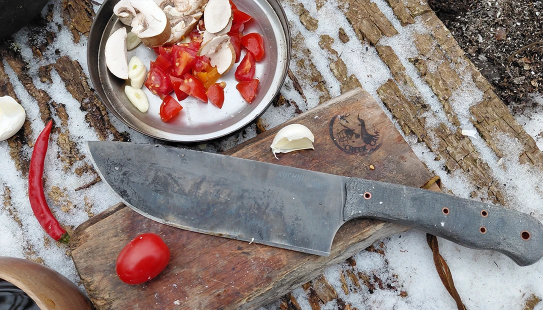 Essential tools for the adventure: a rugged camp knife and a modified hatchet for wood prep.