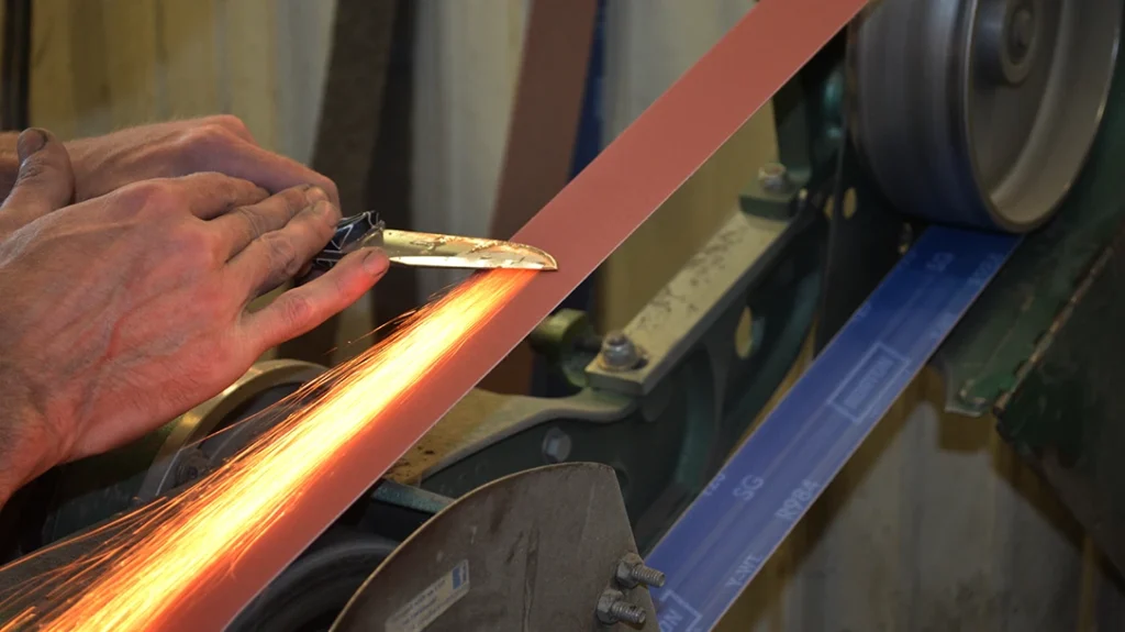 The once-busy grinders at Bark River Knives have fallen silent.