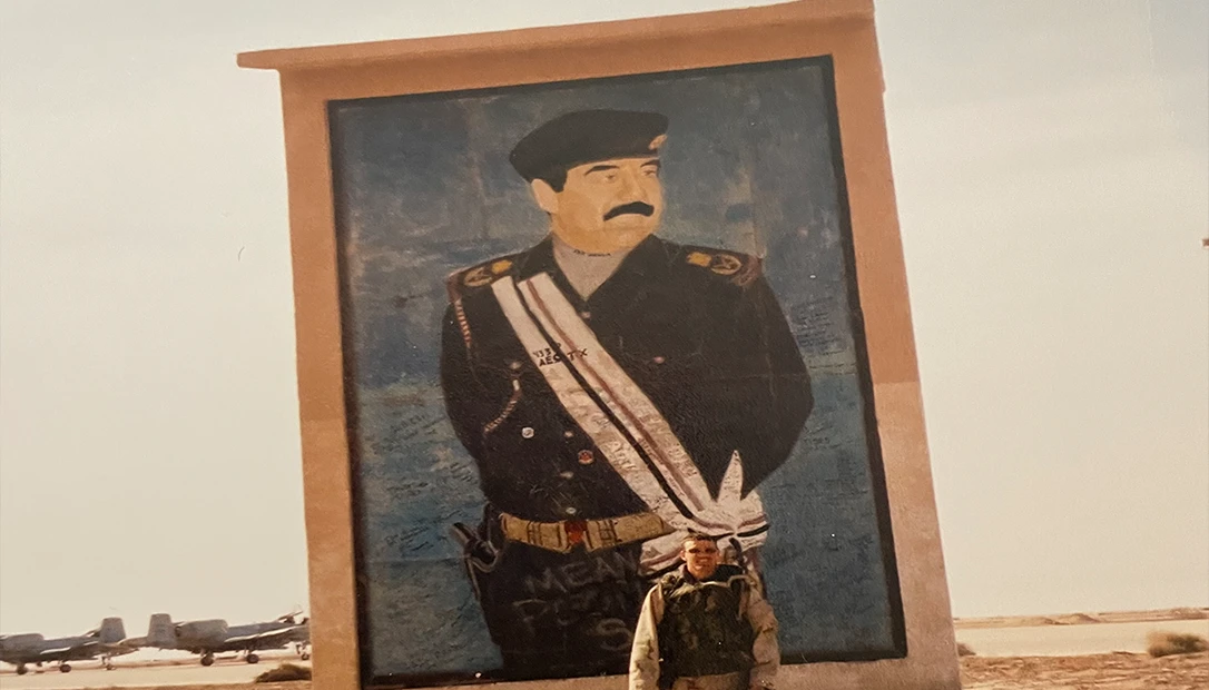 A giant Painting of Saddam Hussein is left in the capital city of Iraq.