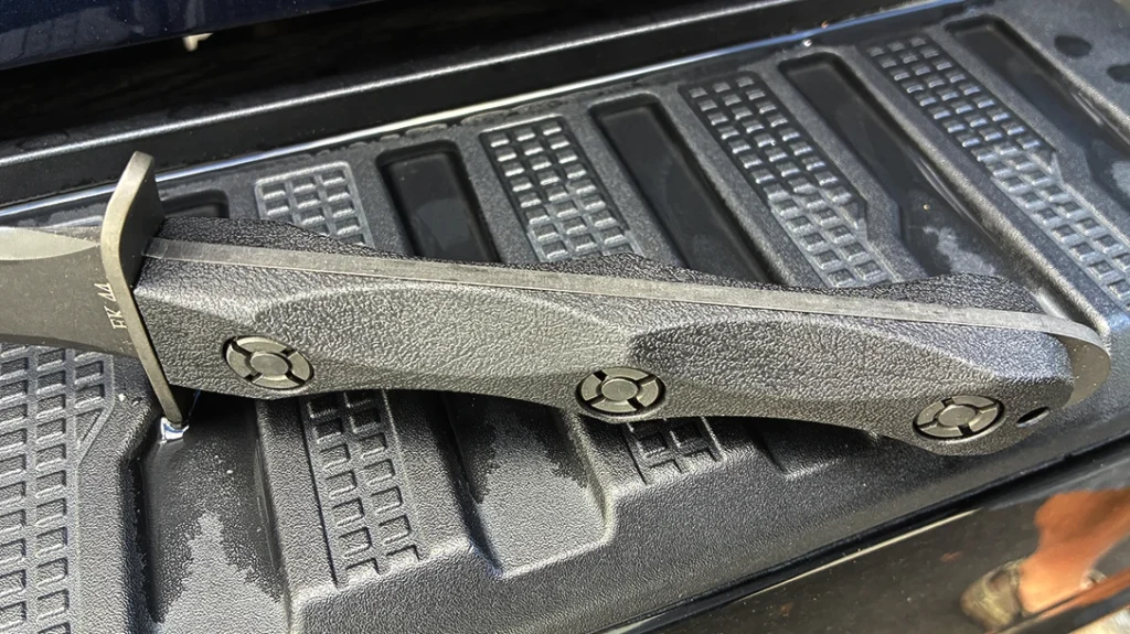 The current Model 4 features scalloped glass-filled nylon handles using X-head fasteners, paying homage to the original Ek methods once the hot-poured lead rivets were phased out.