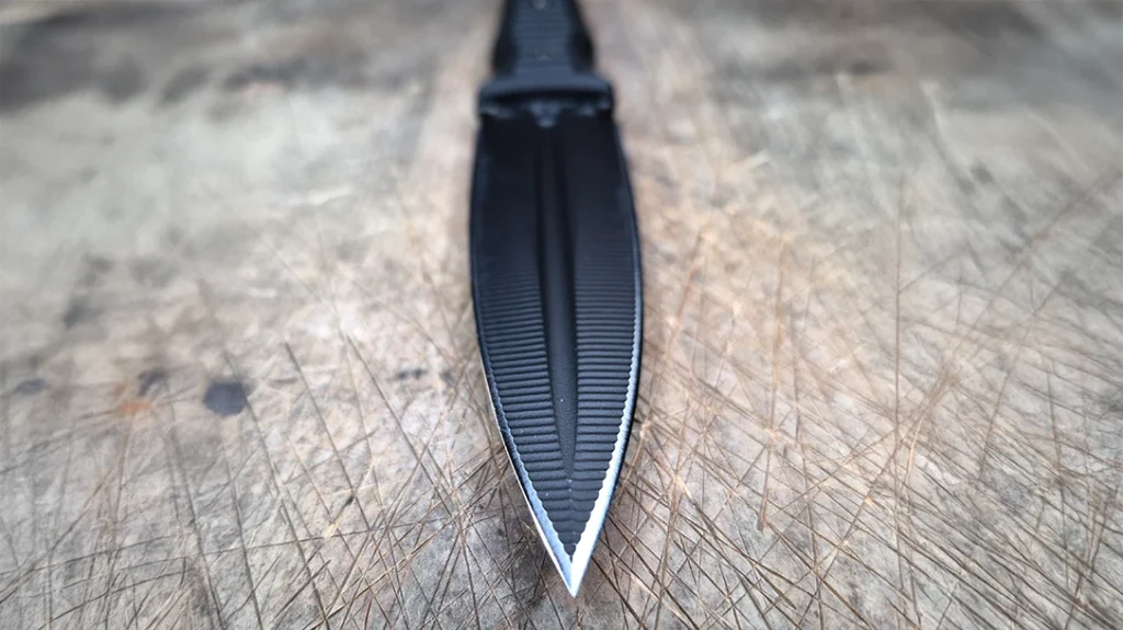 The blade on the RMJ Tactical Orlando Special has some unique texturing as well as a needle-sharp tip.