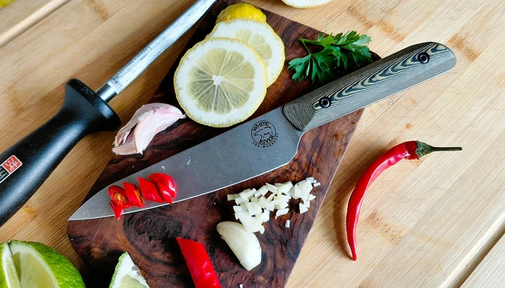 Beginner practicing basic kitchen knife skills on a cutting board with vegetables.