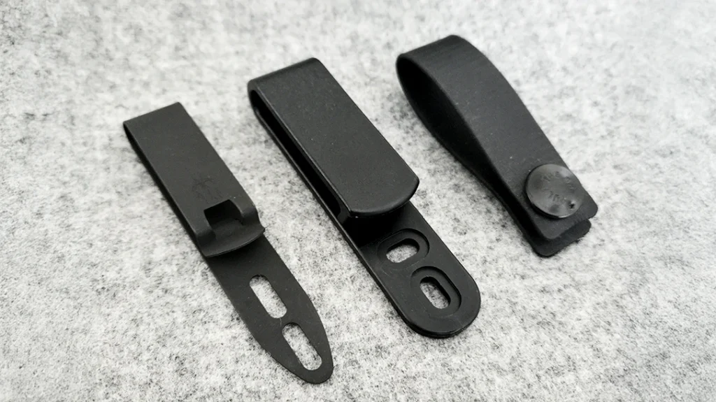 Attachment methods for sheaths vary based on weight, bulk, security, cost, etc.