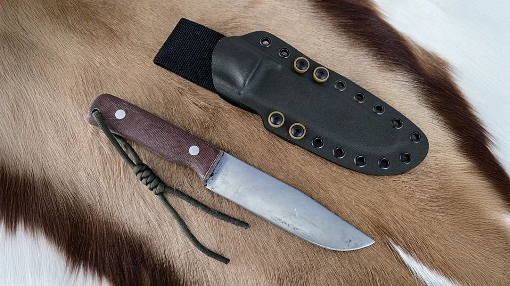 Tim Jones from Tobacco Road Adventures creates some of the finest fitting custom Kydex sheaths, like this belt sheath with drop adapter for a Gossman Knives Tusker Companion.
