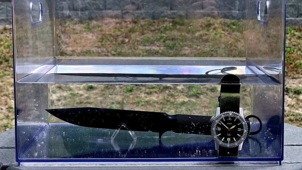 A simple backyard water-resistance test that lasted for hours. No moisture seeped into the handle of the Derek Rausch Revenant MKII, and it guaranteed contents would stay dry when needed.
