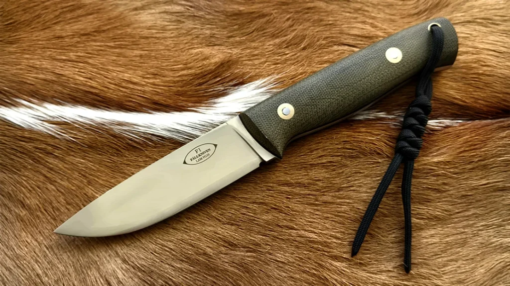The author recently purchased a Fallkniven F1 blade blank from the factory and had Russell Reece of Cohutta Knife handle it to resemble the micarta version he regretted selling years ago.