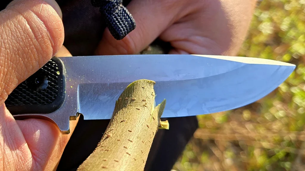 The author used the standard model to chest-lever cut through a branch. The handle shape makes the knife comfortable in every grip used in bushcraft tasks.