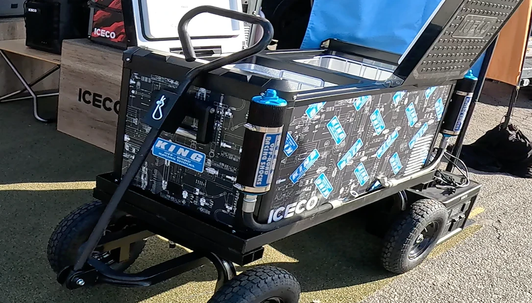 an iceco cooler on big wheels