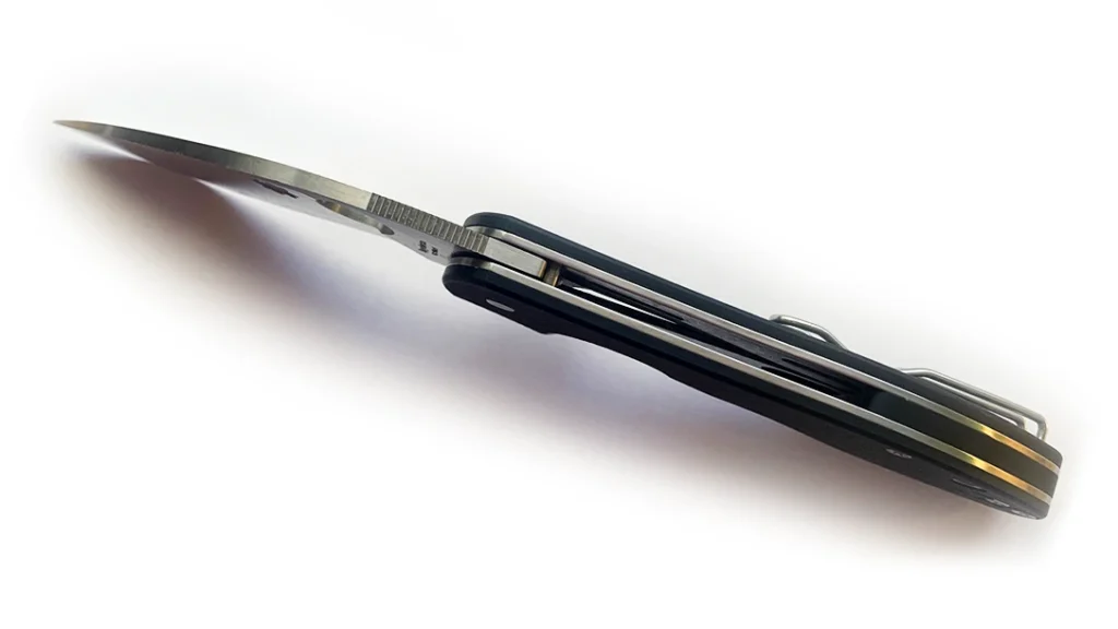 The knife features skeletonized stainless steel liners covered with a G-10 handle that combine to create the aforementioned heft.