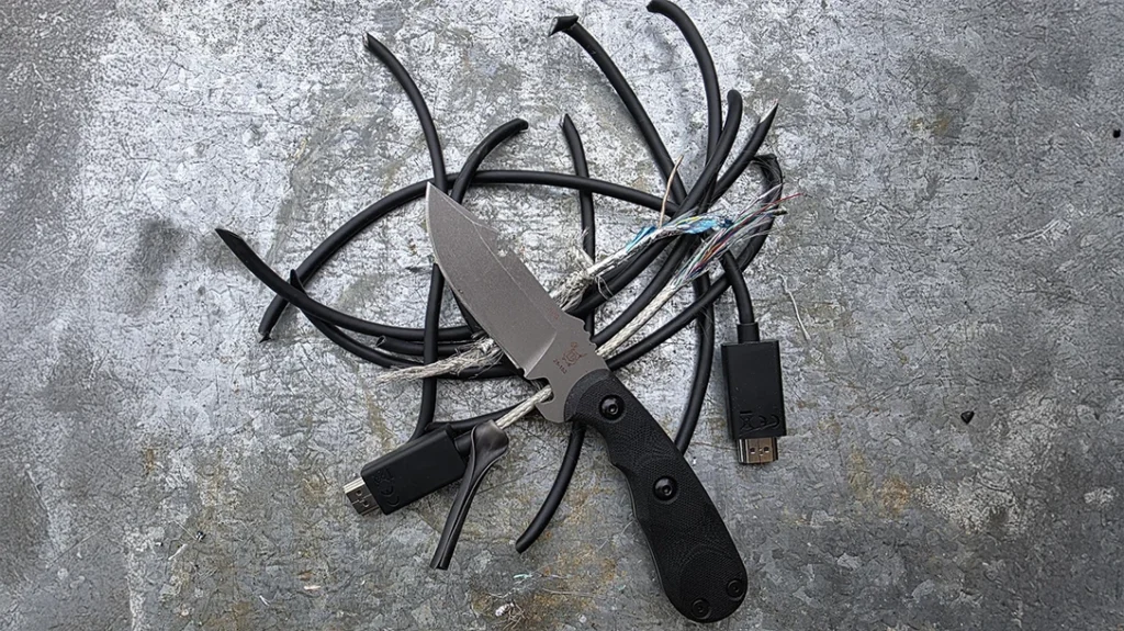 The TOPS Knives Road Pup Goyo ate through the wires without any challenge.
