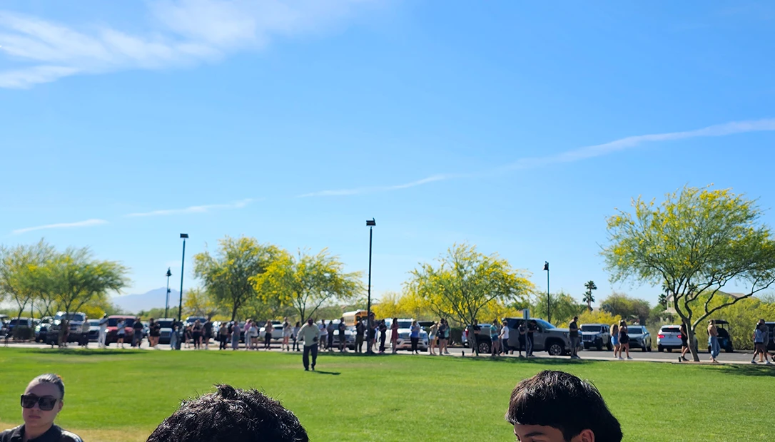 Multi-point verification using limited stations created a bottleneck as parents queued for student release.