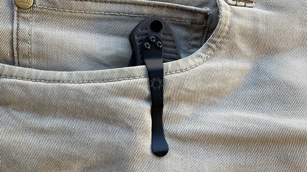 The scales are drilled for all four carry positions—tip up or tip down, right or left handed.