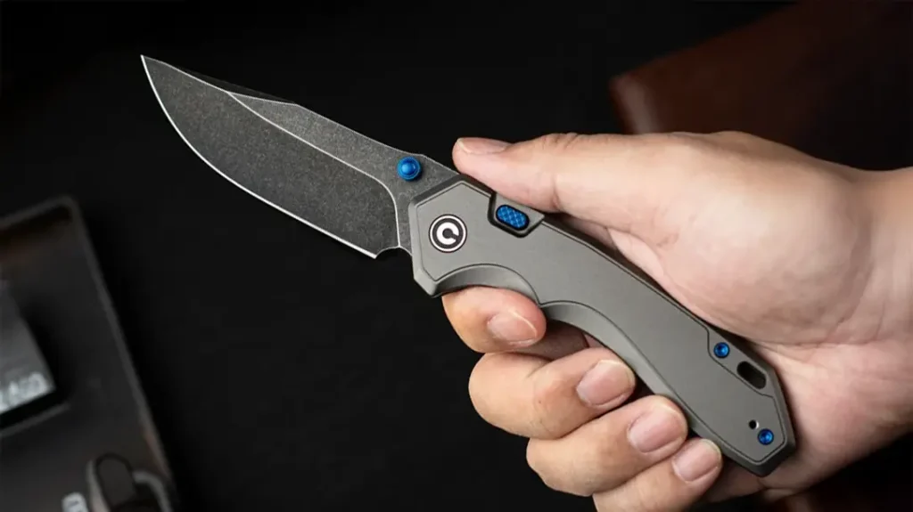 A hand holding the knife.