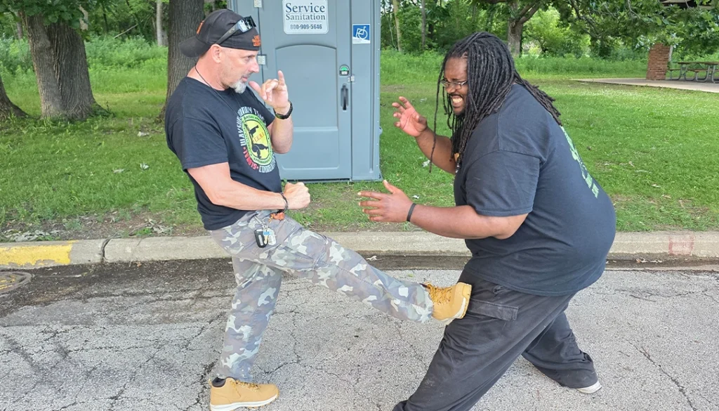 kick him in the leg